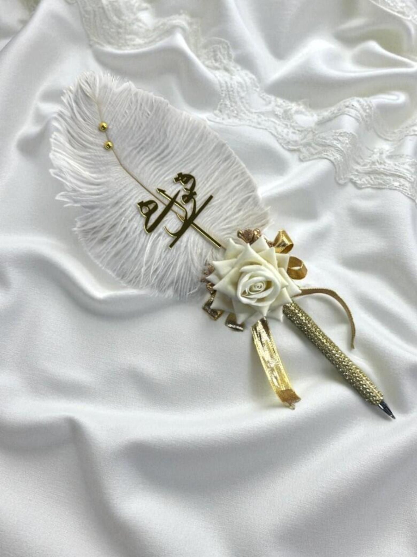 Handcrafted white and gold Nikah pen with feather, rose, and ribbon design by Nikkahday 2
